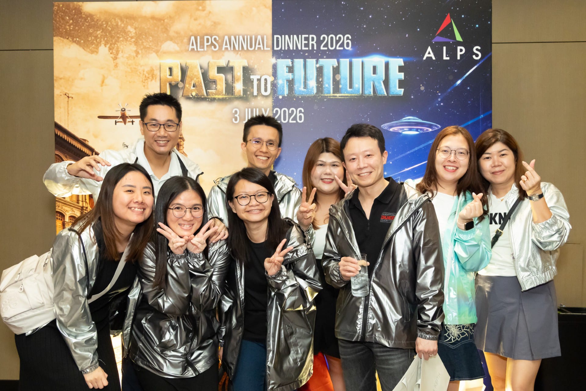 Photo of 9 ALPS staff taken at ALPS Anniversary Dinner